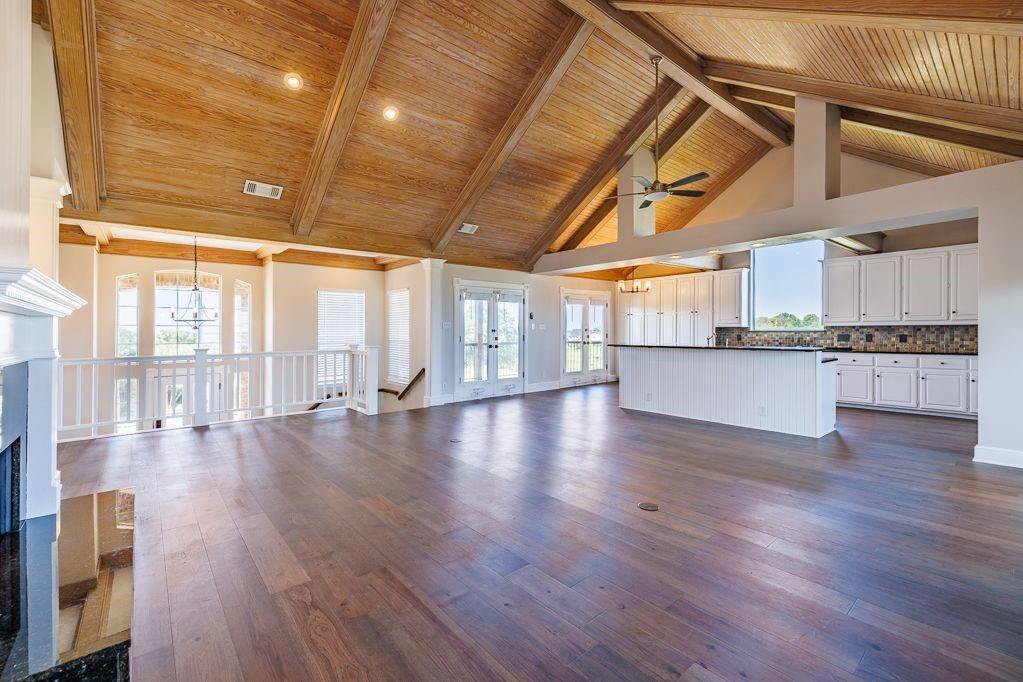 11507 Clipper Circle Frisco, TX 75036 - Photo 13 of 40 a view of a kitchen with stainless steel appliances granite countertop a stove and wooden floor