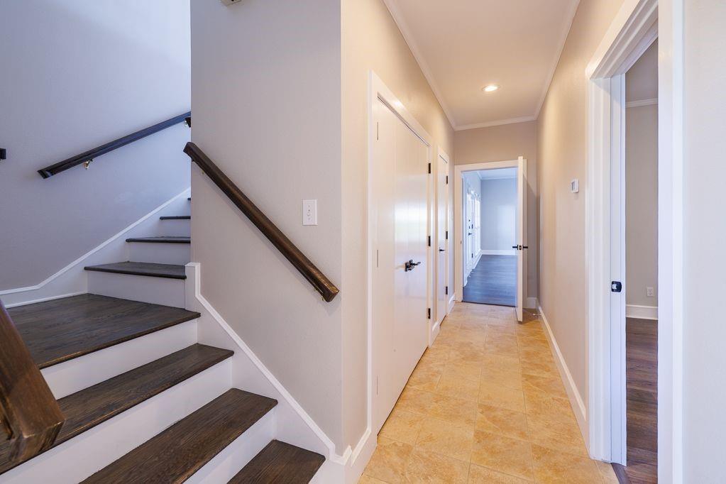 11507 Clipper Circle Frisco, TX 75036 - Photo 28 of 40 a view of a hallway with wooden floor and staircase