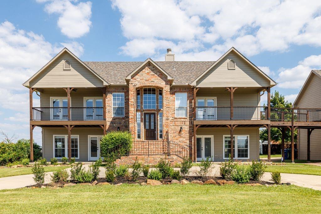 11507 Clipper Circle Frisco, TX 75036 - Photo 3 of 40 a front view of a house with yard porch and fire pit