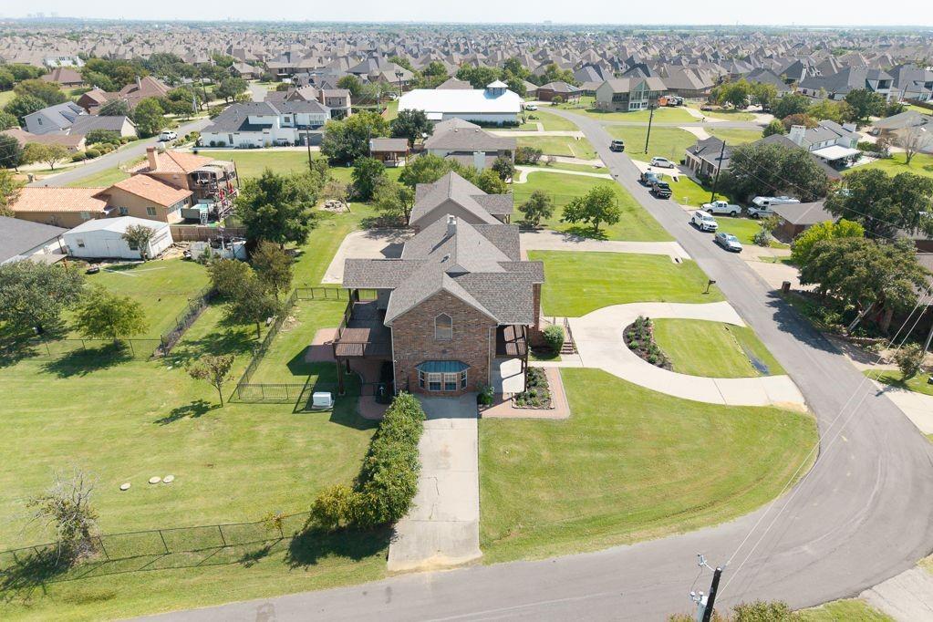 11507 Clipper Circle Frisco, TX 75036 - Photo 8 of 40 an aerial view of residential houses with outdoor space and parking