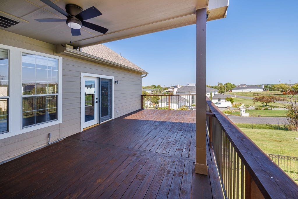 11507 Clipper Circle Frisco, TX 75036 - Photo 10 of 40 a view of balcony with wooden floor and seating space