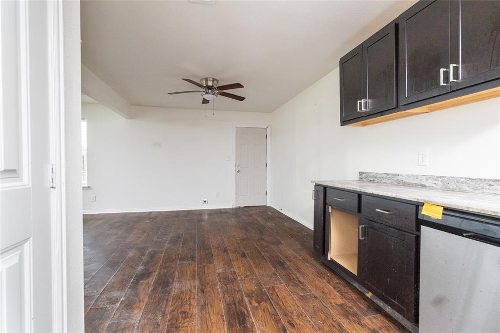 805 East Belt Line Road DeSoto, TX 75115 - Photo 8 of 15 a view of a kitchen from the hallway