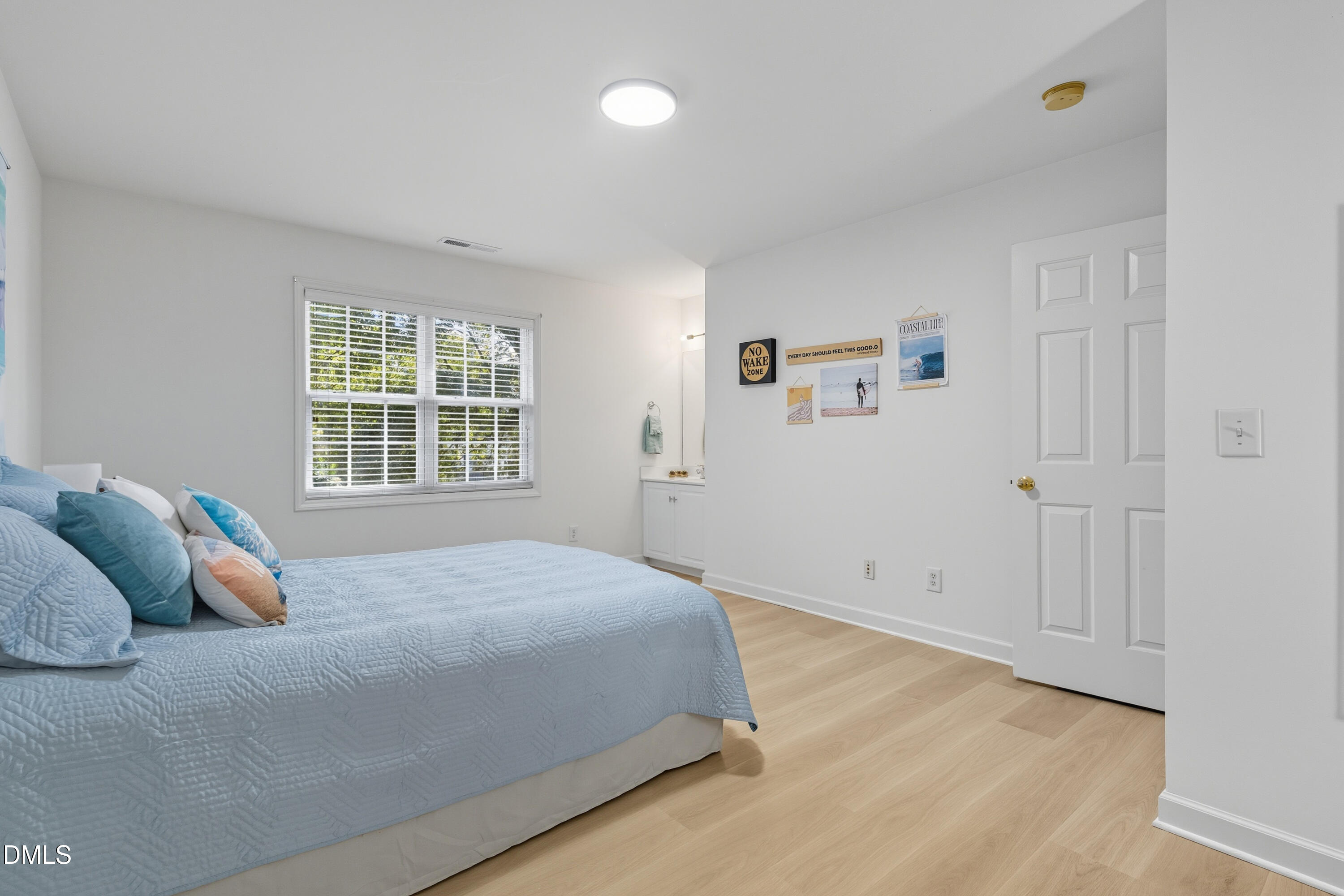 100 Raven Lane Carrboro, NC 27510 - Photo 15 of 31 a bedroom with a bed and a window