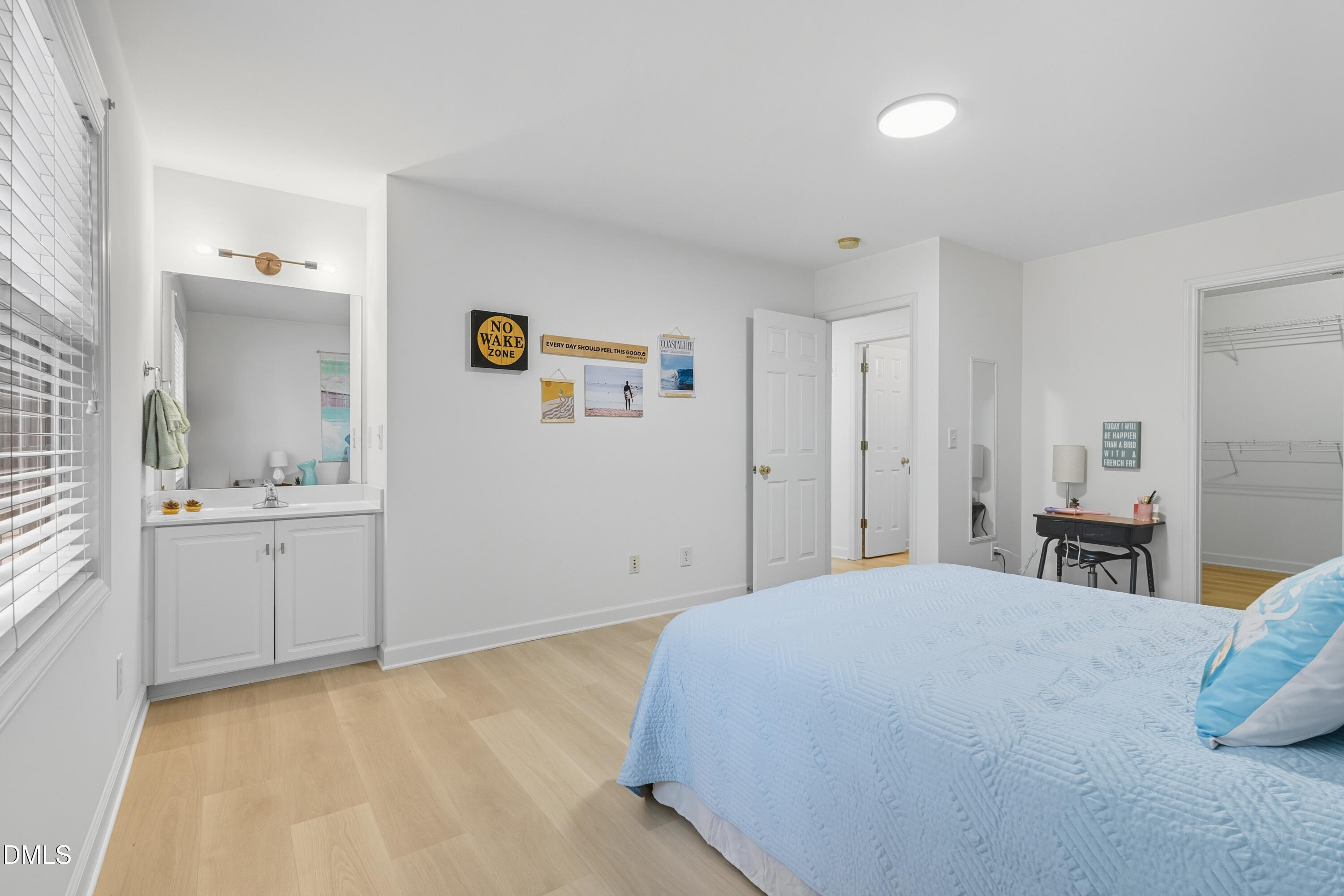100 Raven Lane Carrboro, NC 27510 - Photo 16 of 31 a bedroom with a bed and a view of kitchen