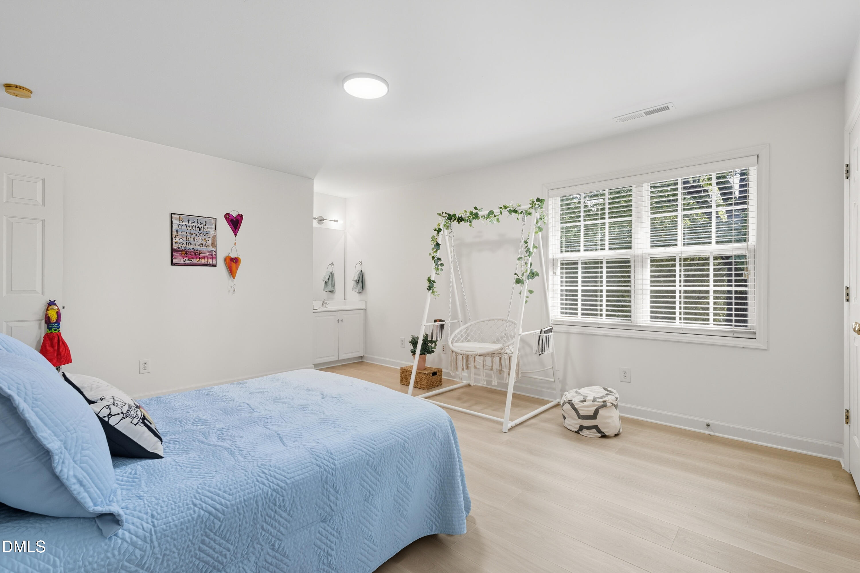 100 Raven Lane Carrboro, NC 27510 - Photo 19 of 31 a bedroom with a bed and a window
