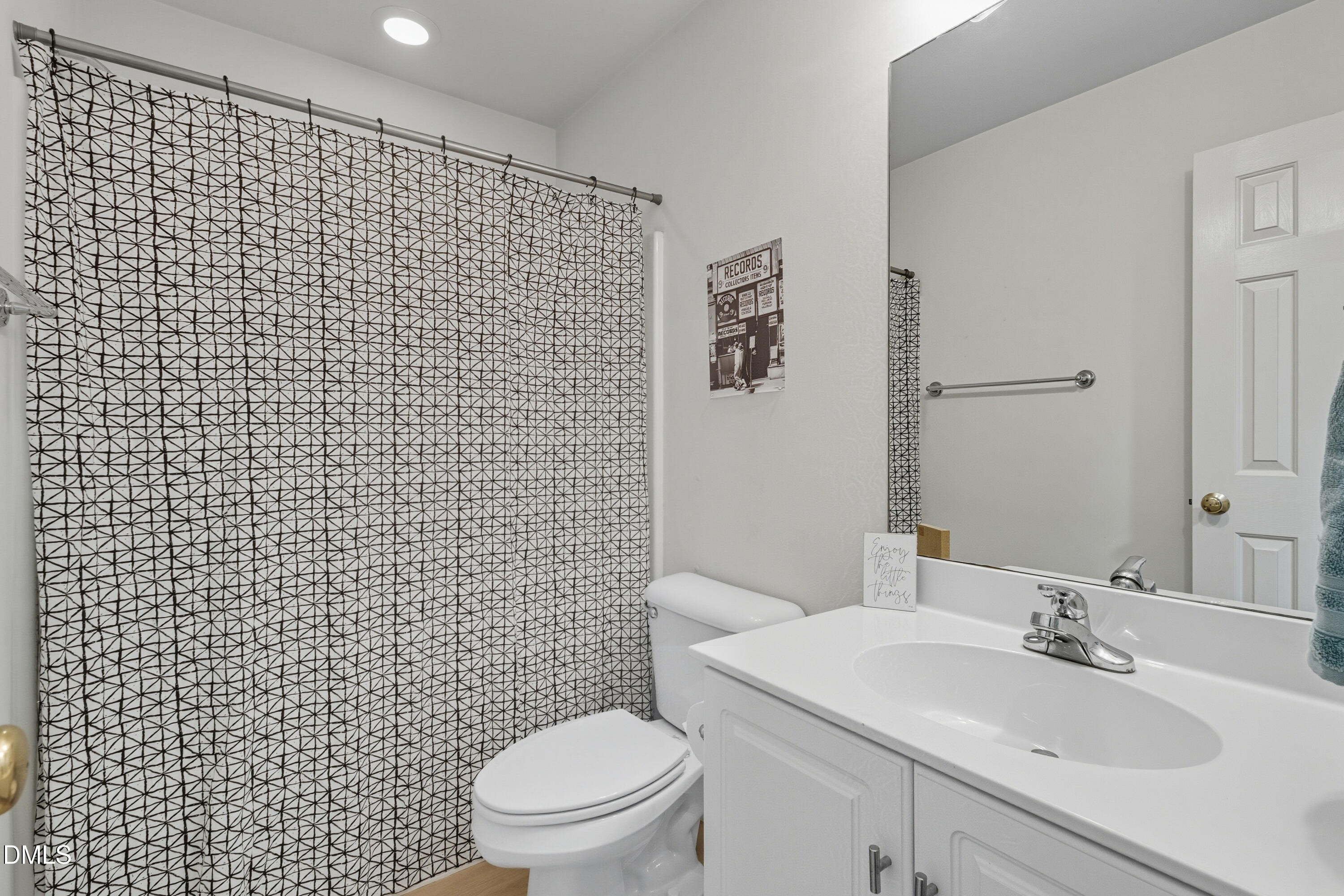 100 Raven Lane Carrboro, NC 27510 - Photo 21 of 31 a bathroom with a sink toilet and a mirror