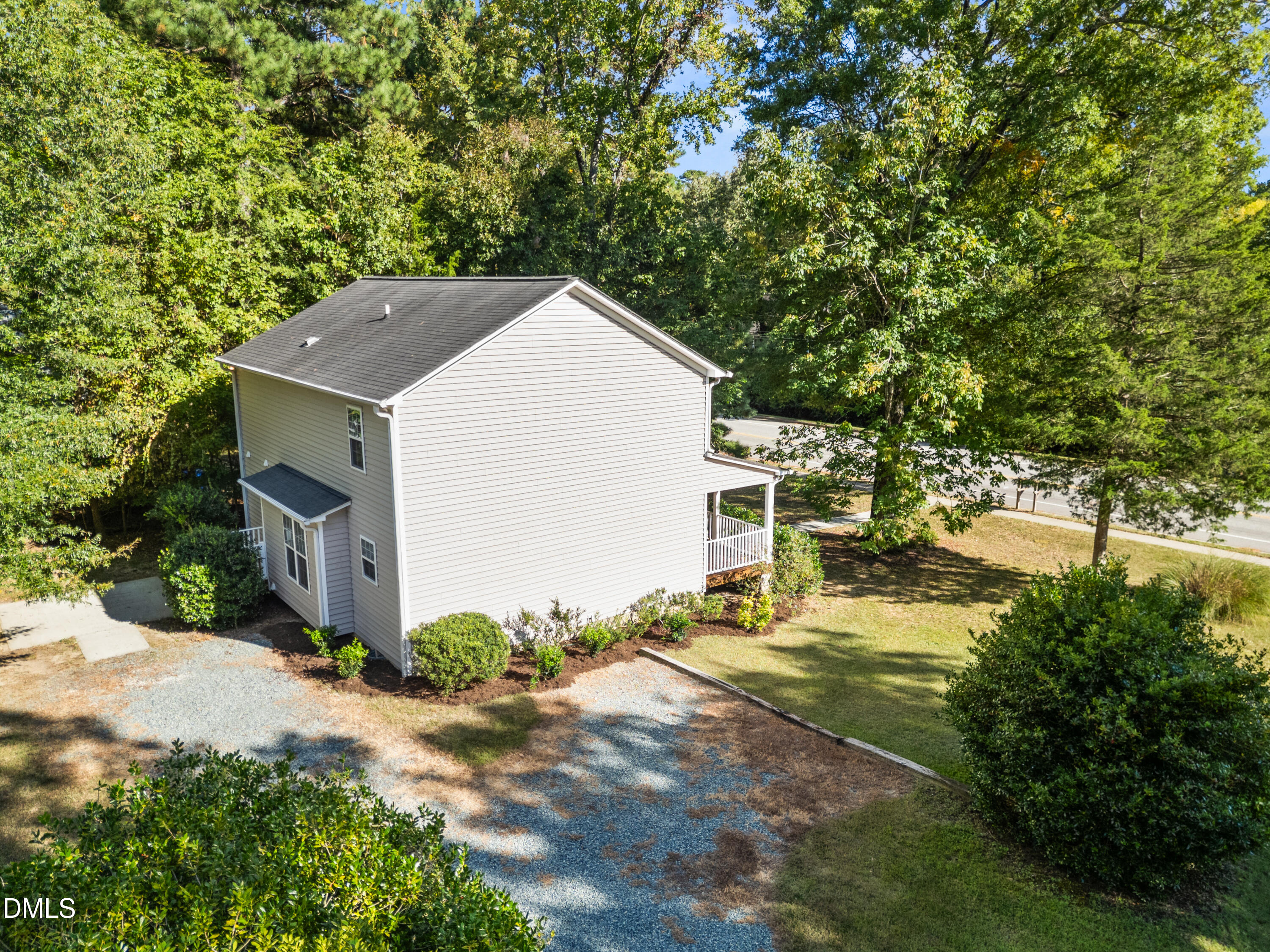 100 Raven Lane Carrboro, NC 27510 - Photo 26 of 31 a view of a house with backyard and sitting area