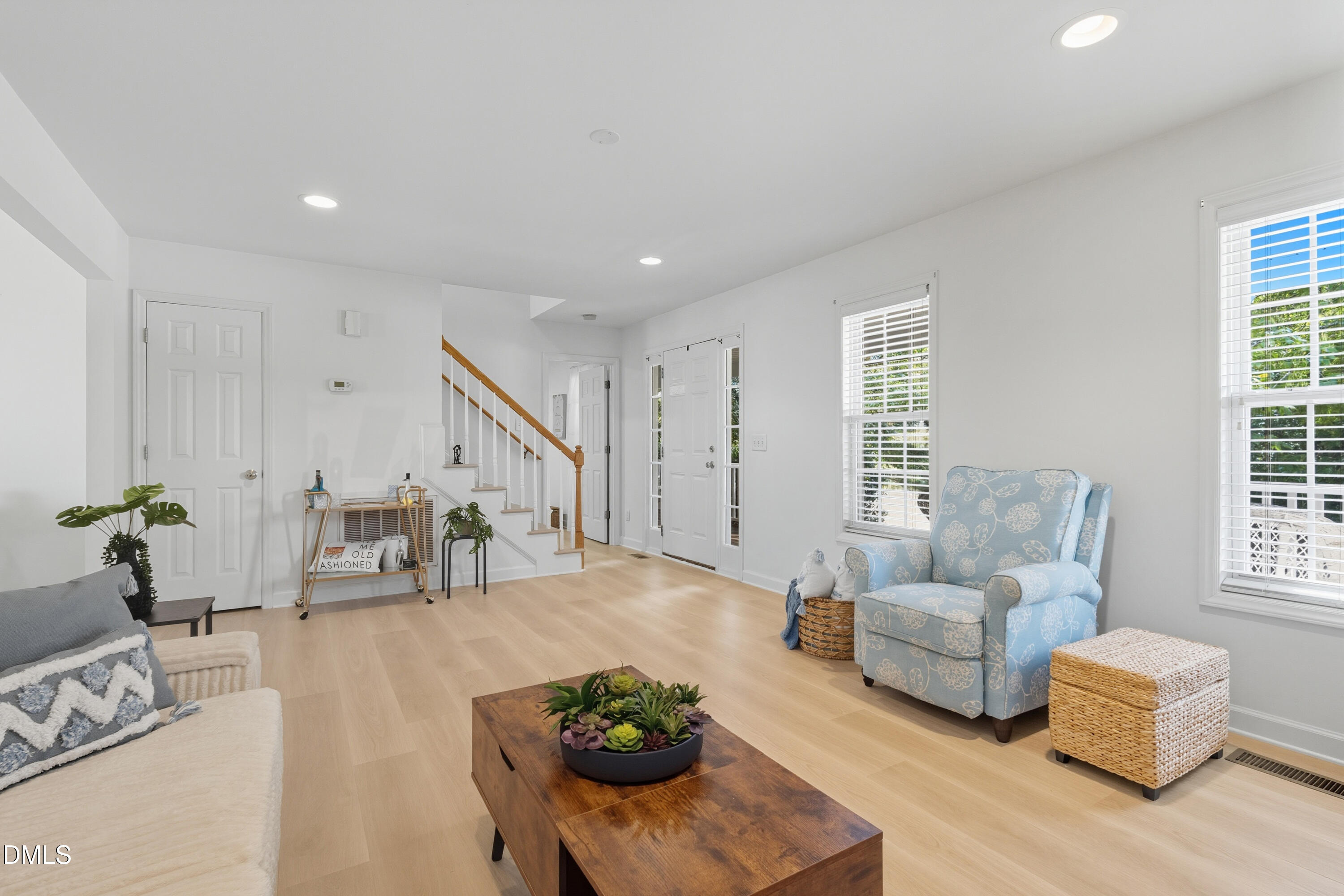 100 Raven Lane Carrboro, NC 27510 - Photo 3 of 31 a living room with furniture and wooden floor
