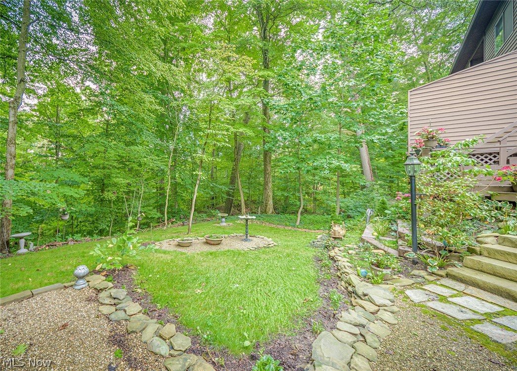 836 Hampton Ridge Drive Akron, OH 44313 - Photo 31 of 33 Beautiful, large trees offer privacy and a peaceful setting.