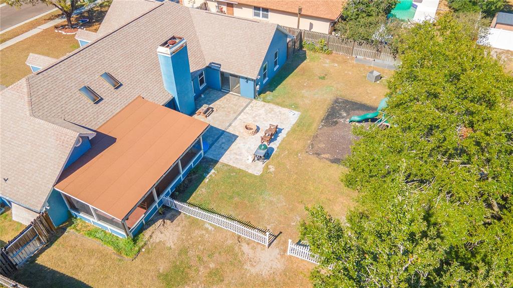 3908 Rosedale Drive Brandon, FL 33511 - Photo 44 of 45 an aerial view of residential house with pool and yard
