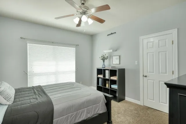 a kitchen with a sink a stove and cabinets