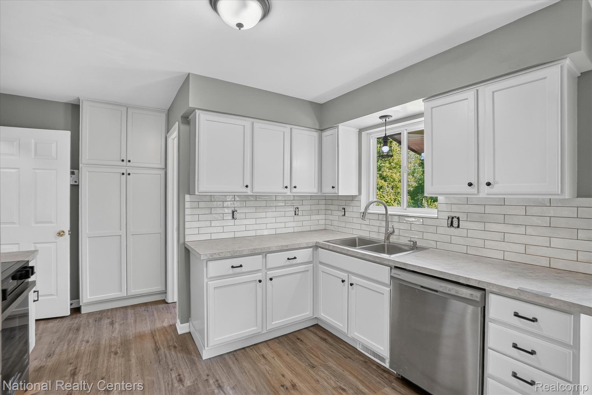 8280 West Rolston Road Linden, MI 48451 - Photo 9 of 47 New counters & tile backsplash in Kitchen