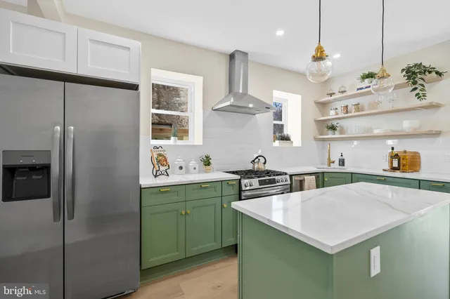 a view of a house with a ocean view