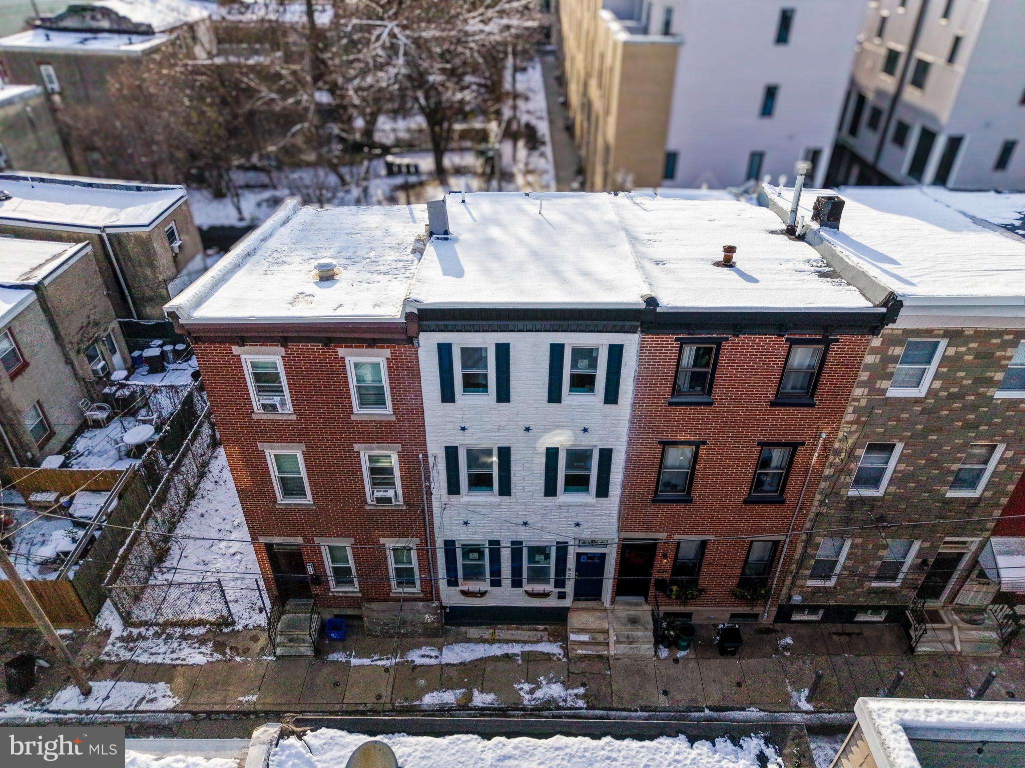 824 Leland Street Philadelphia, PA 19130 - Photo 2 of 6 a patio with table and chairs