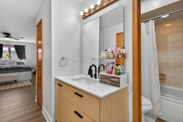a bathroom with a sink and a mirror