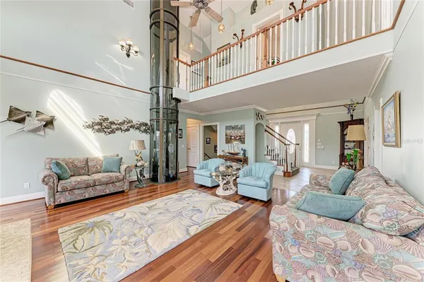 a kitchen with stainless steel appliances kitchen island granite countertop a sink and cabinets