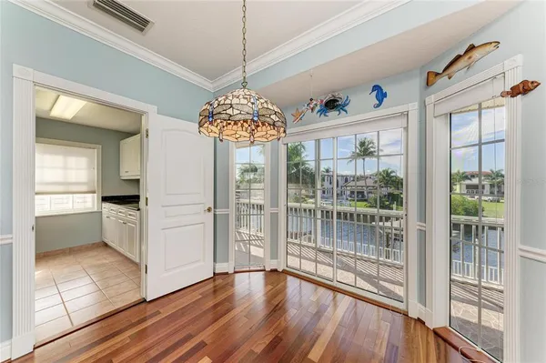 a kitchen with stainless steel appliances granite countertop a stove and a sink