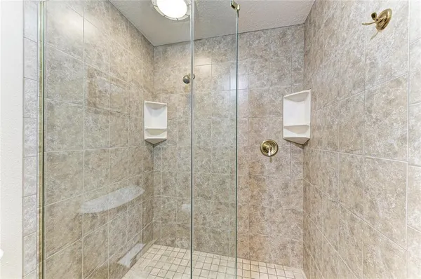 a view of a livingroom with furniture and a chandelier