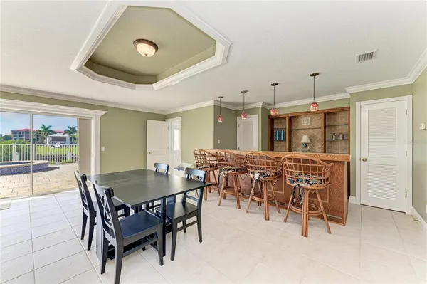 an aerial view of a house with a ocean view