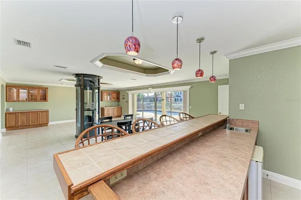 an aerial view of a house with a garden potted plants