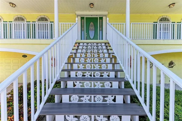 a living room with furniture fireplace and a flat screen tv