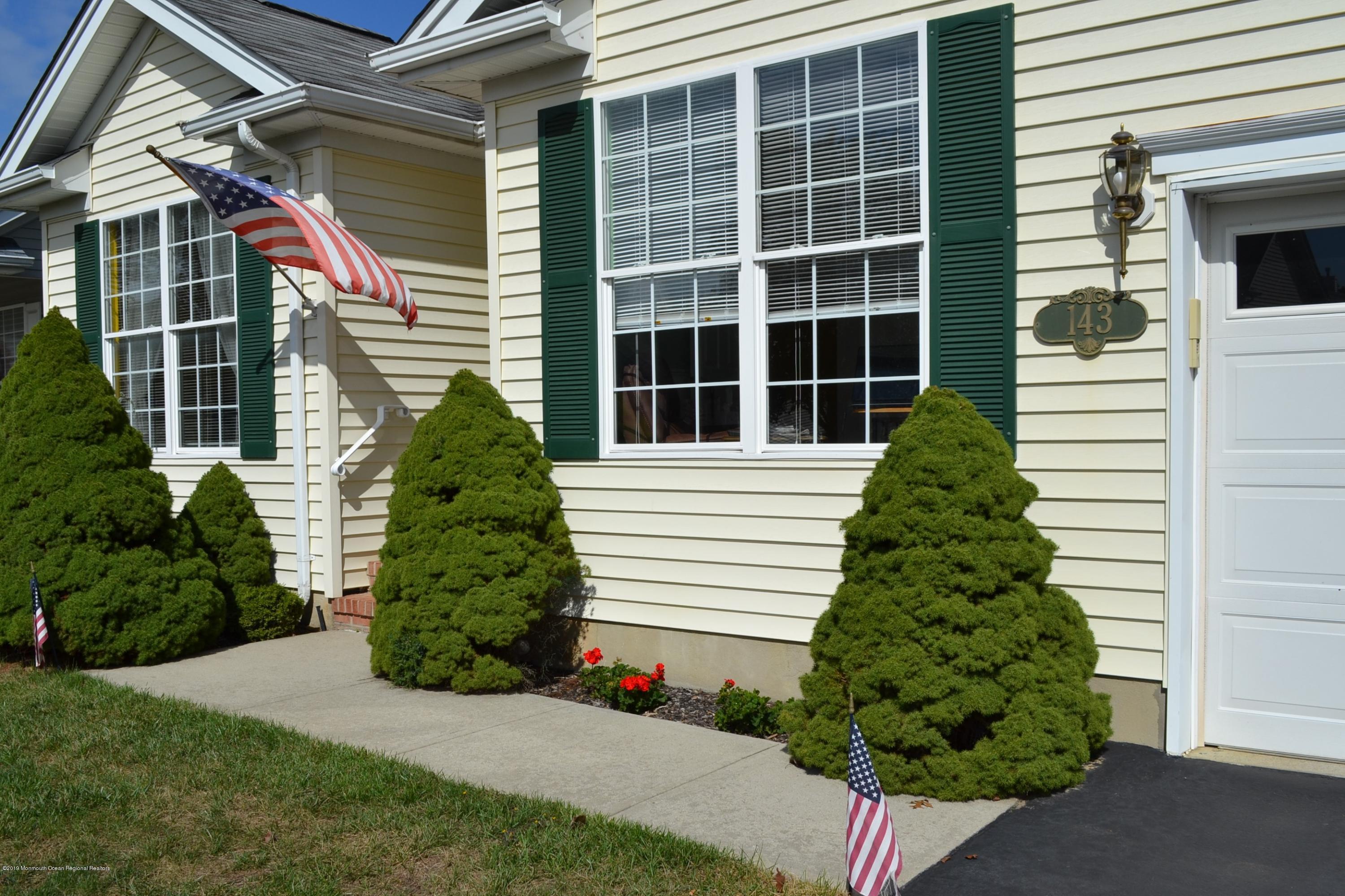143 Wordsworth Road Brick, NJ 08724 - Photo 3 of 41 a front view of a house with a yard