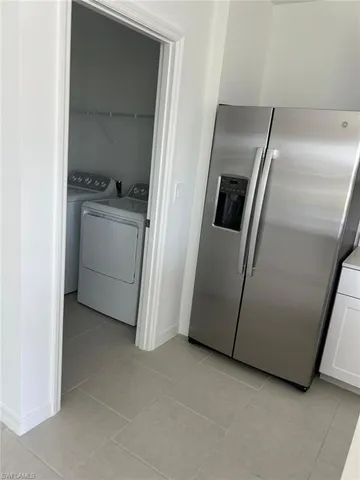 a kitchen that has a sink and a stove