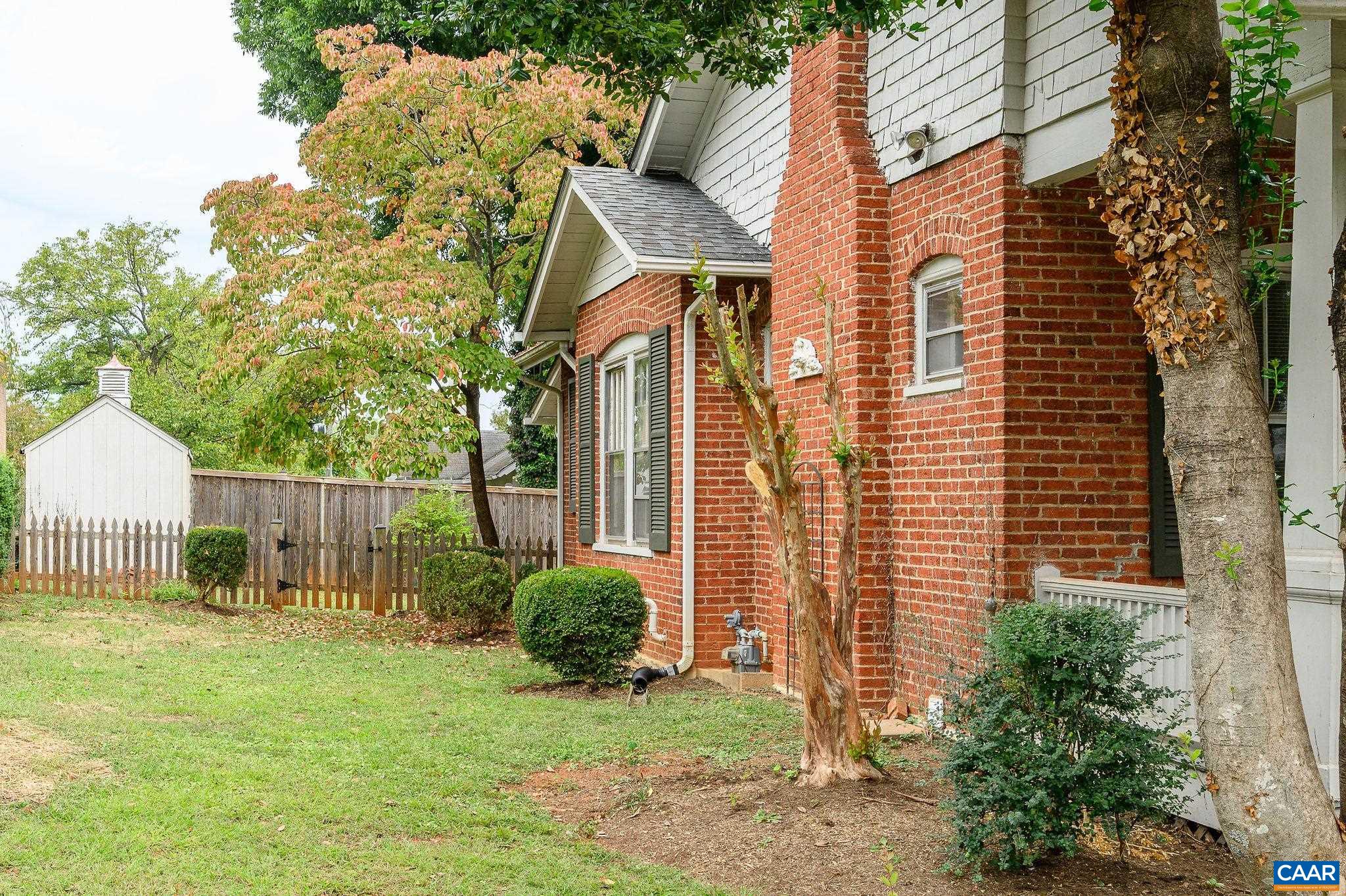 211 Robertson Avenue Charlottesville, VA 22903 - Photo 21 of 28 a view of a house with a yard and plants