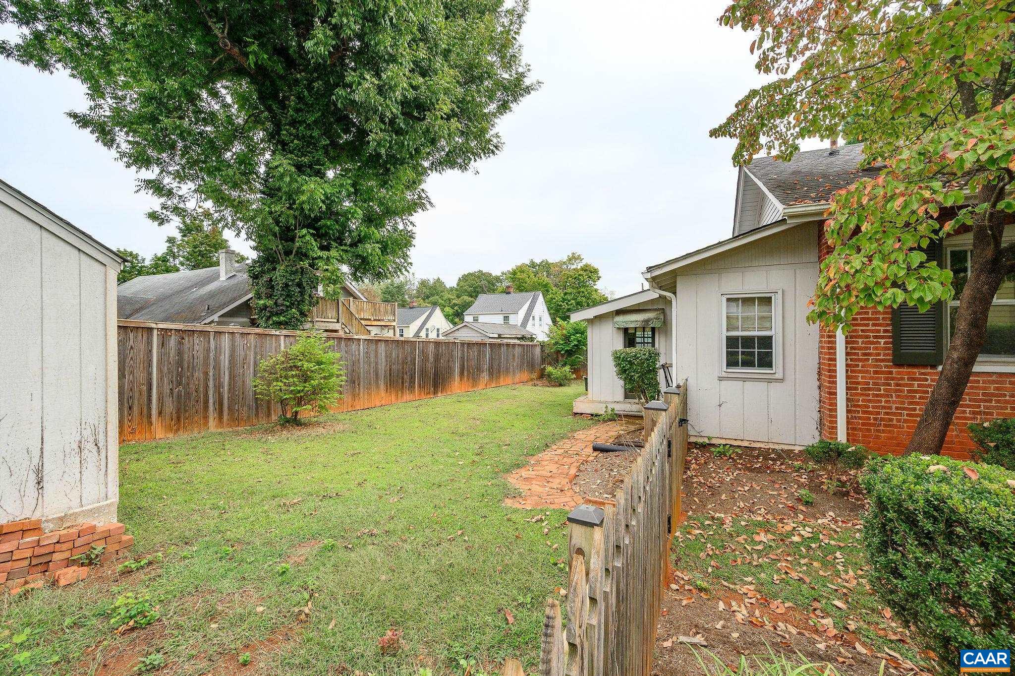 211 Robertson Avenue Charlottesville, VA 22903 - Photo 23 of 28 a front view of a house with yard and tree