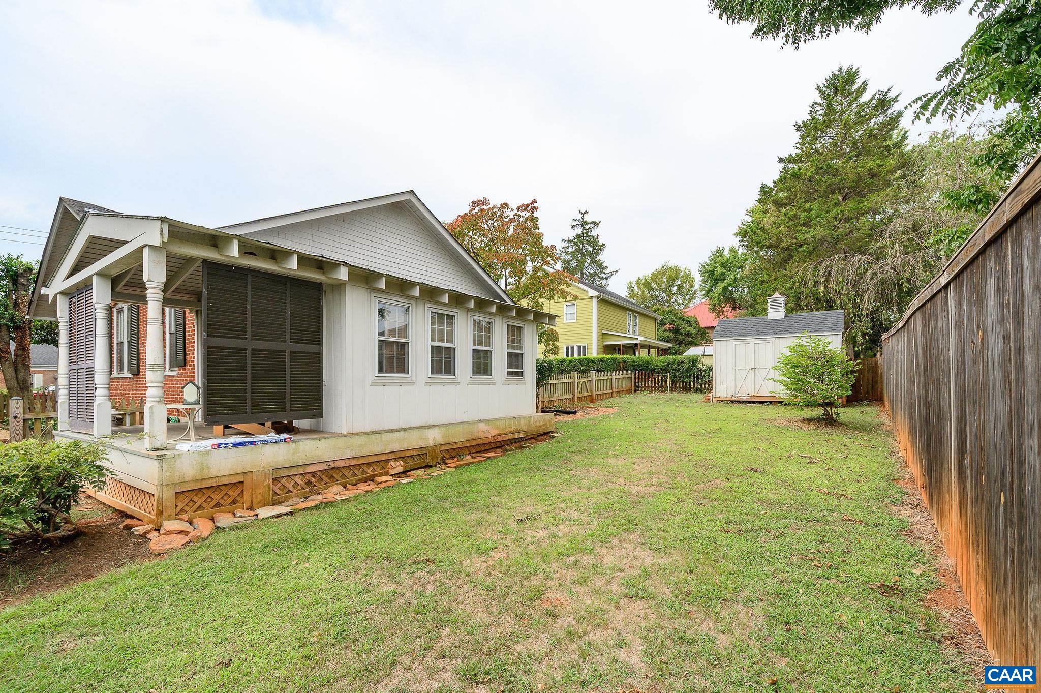 211 Robertson Avenue Charlottesville, VA 22903 - Photo 24 of 28 a front view of a house with a yard
