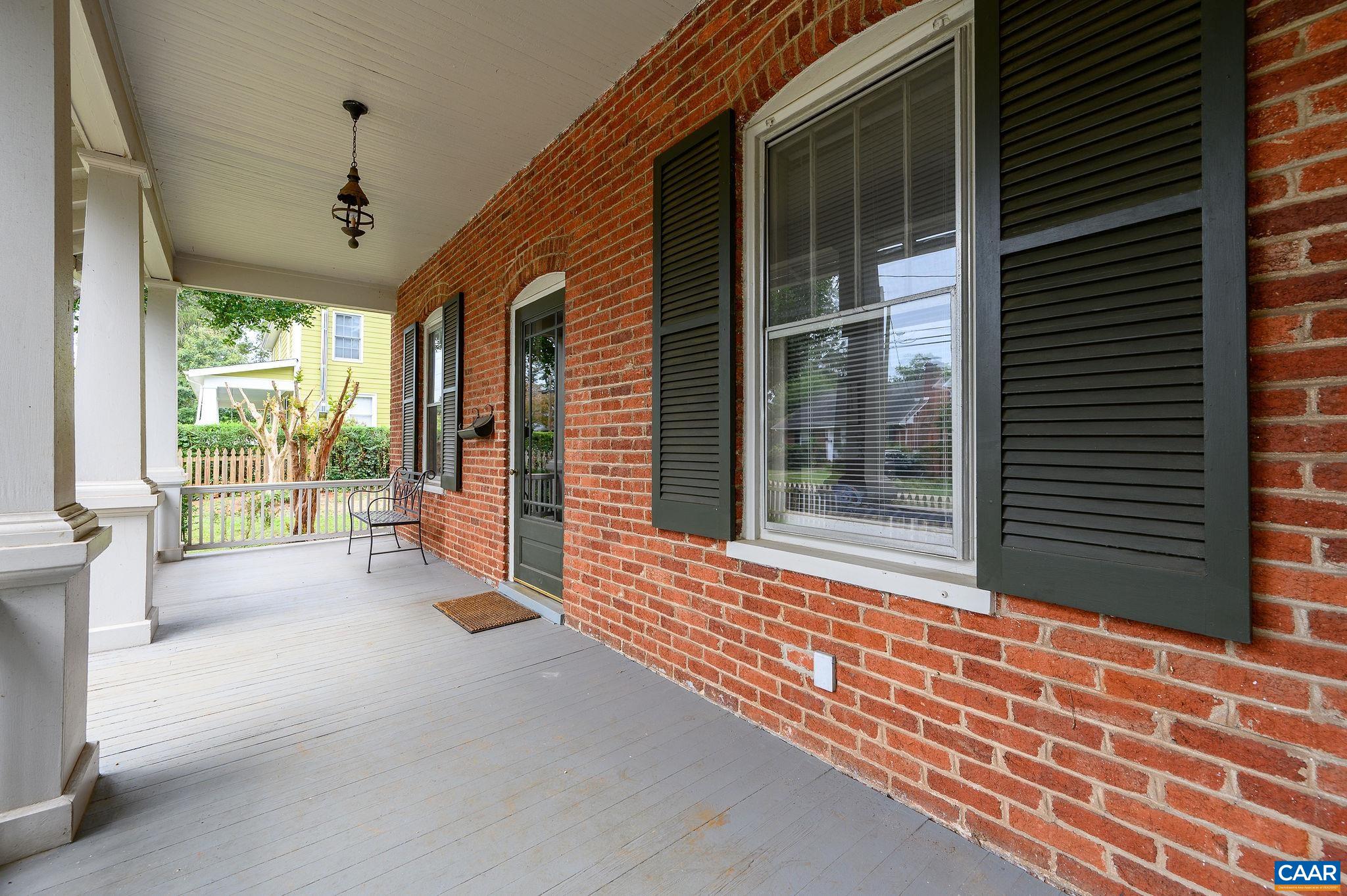 211 Robertson Avenue Charlottesville, VA 22903 - Photo 3 of 28 a view of a house with porch and wooden floor