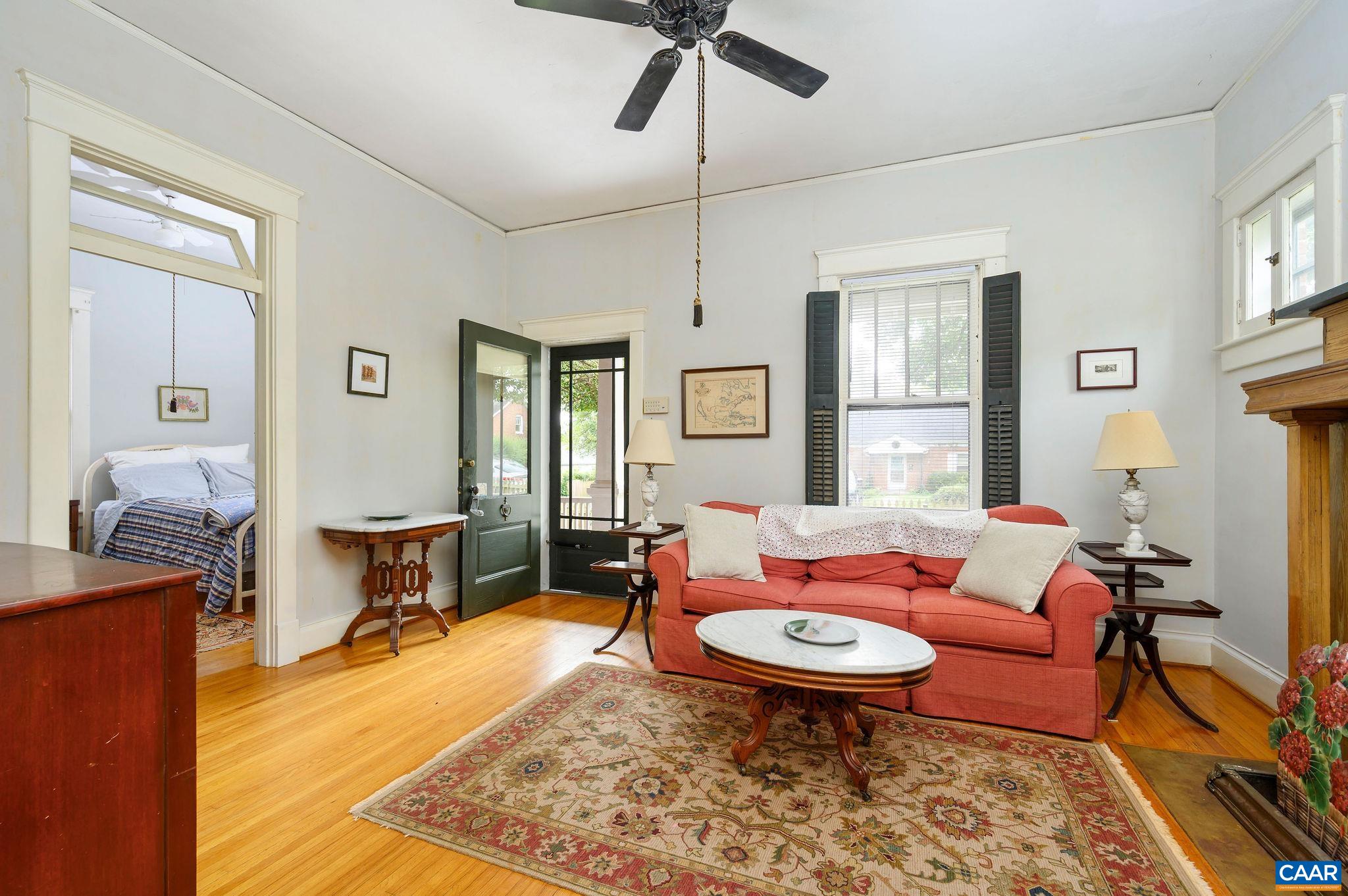 211 Robertson Avenue Charlottesville, VA 22903 - Photo 6 of 28 a living room with furniture a rug and a window