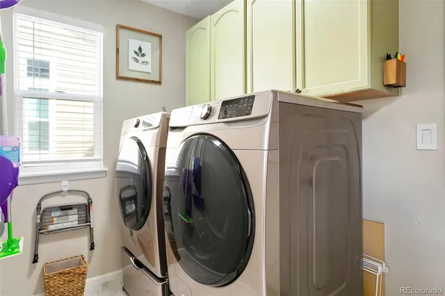 a utility room with dryer and washer