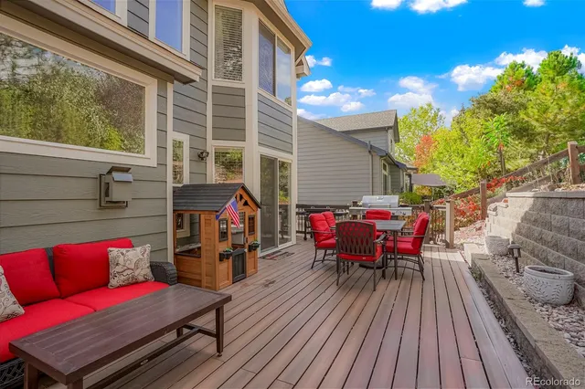 a view of a red chairs in front of a house