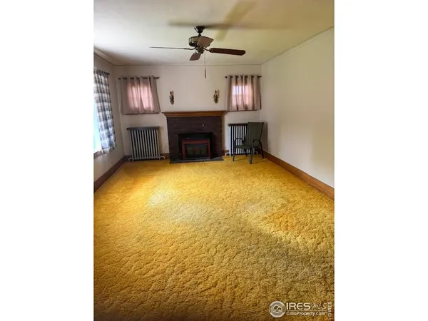 a view of kitchen and dining room with furniture
