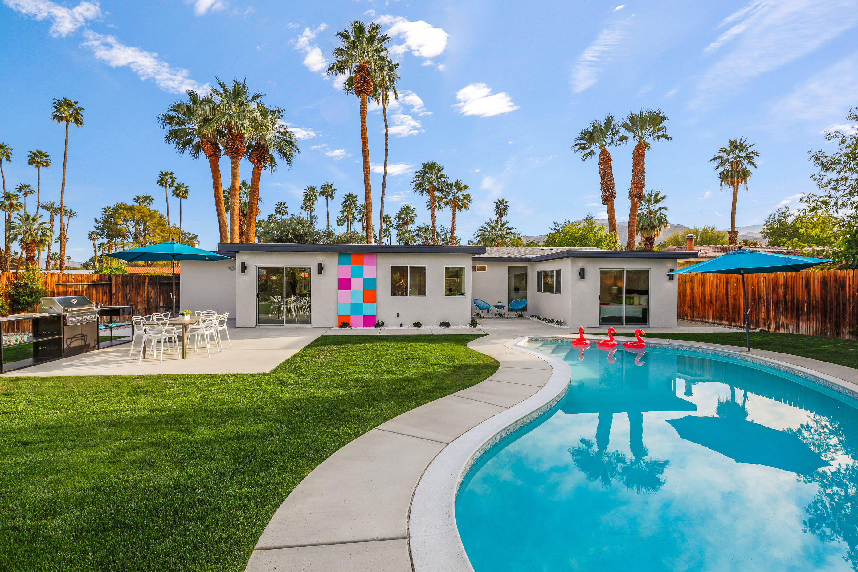 70170 Sun Valley Drive Rancho Mirage, CA 92270 - Photo 1 of 25 a view of a house with swimming pool and sitting area