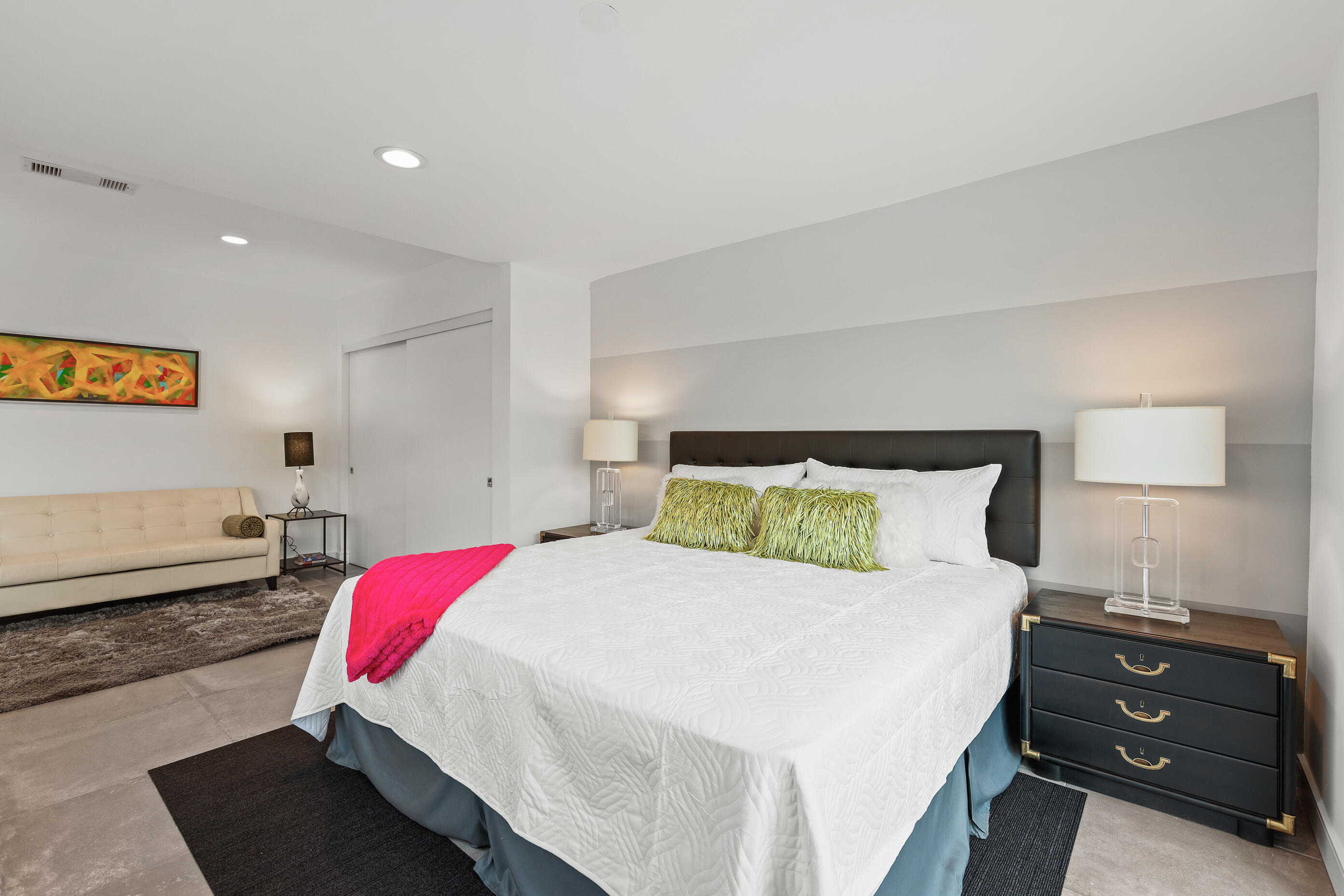 70170 Sun Valley Drive Rancho Mirage, CA 92270 - Photo 16 of 25 a bedroom with a bed and a lamp
