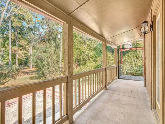 a view of a park with large trees