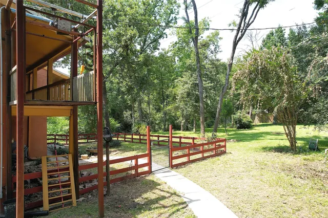 a view of small pool in the backyard