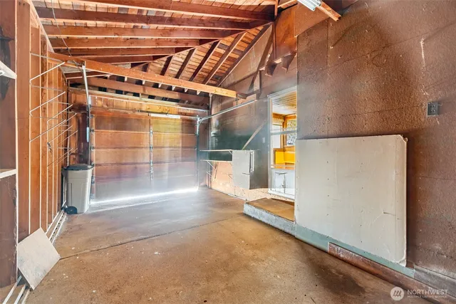 a view of a hallway with a window