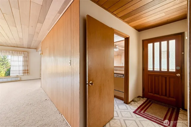 a view of a big room with a painting