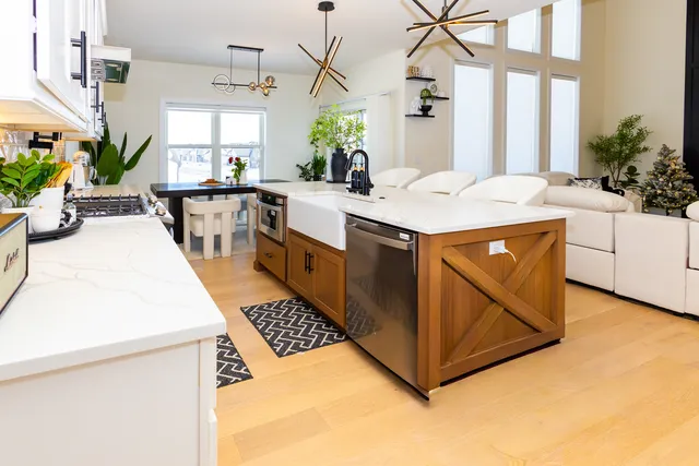 a dining room with furniture and wooden floor