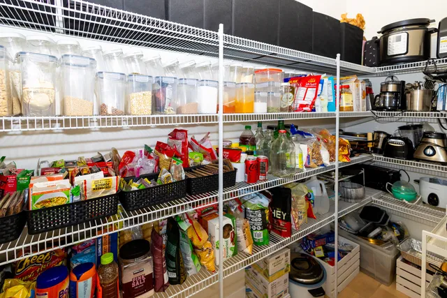 a close view of light fixtures and potted plants on a table
