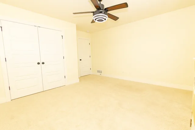 a view of balcony with wooden floor