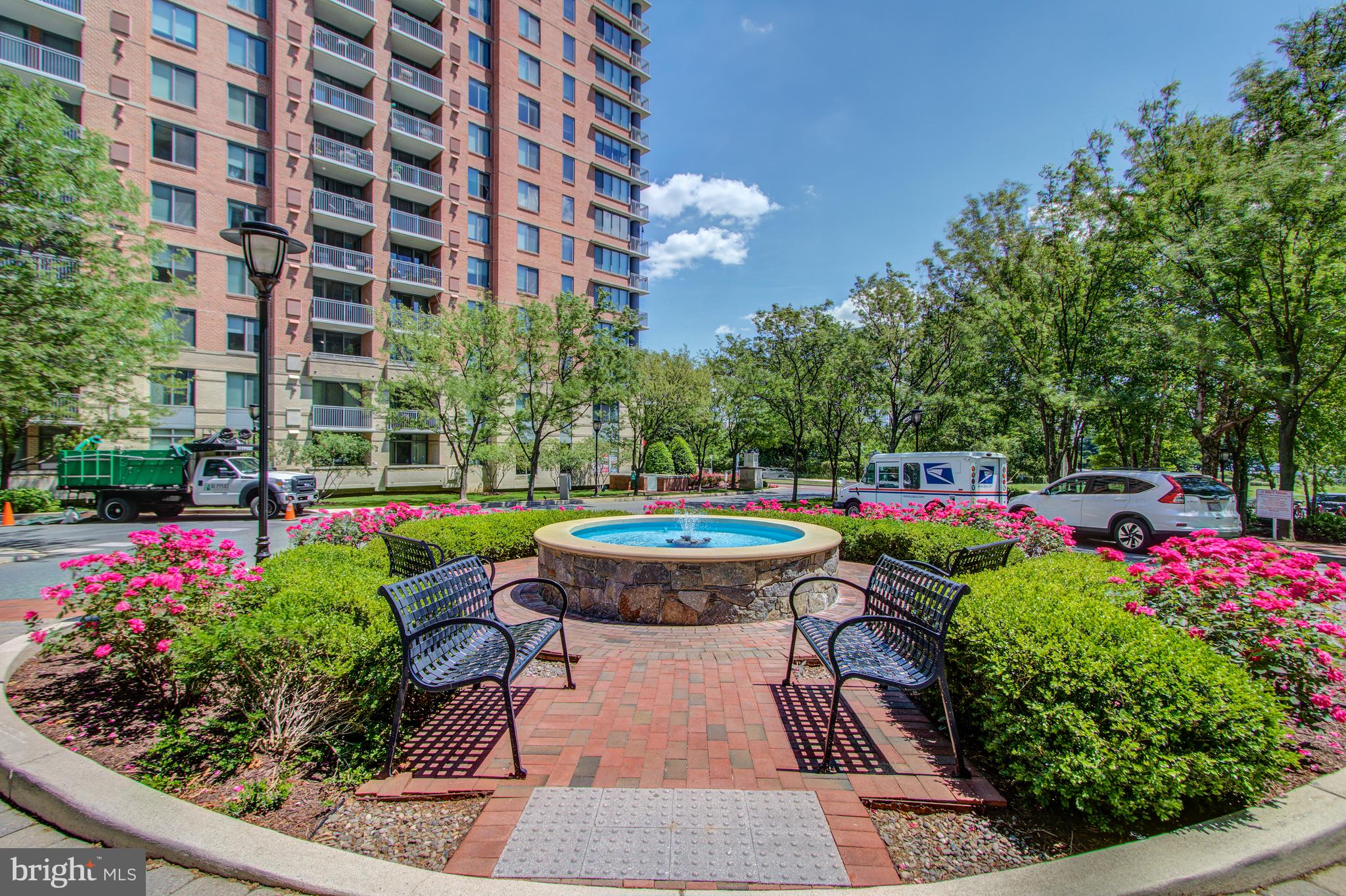 11700 Old Georgetown Road, Unit 214 Rockville, MD 20852 - Photo 42 of 44 a view of a swimming pool with sitting area