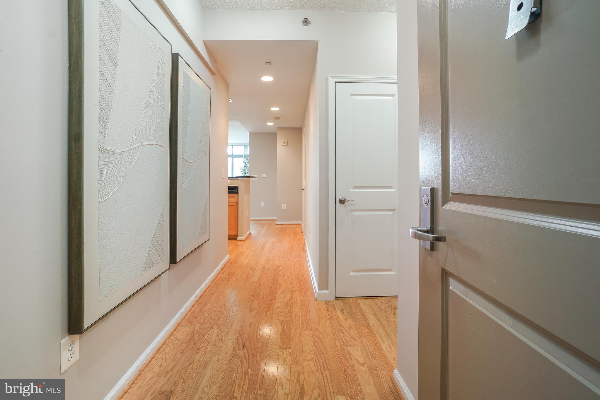 11700 Old Georgetown Road, Unit 214 Rockville, MD 20852 - Photo 6 of 44 a view of a bathroom from the hallway