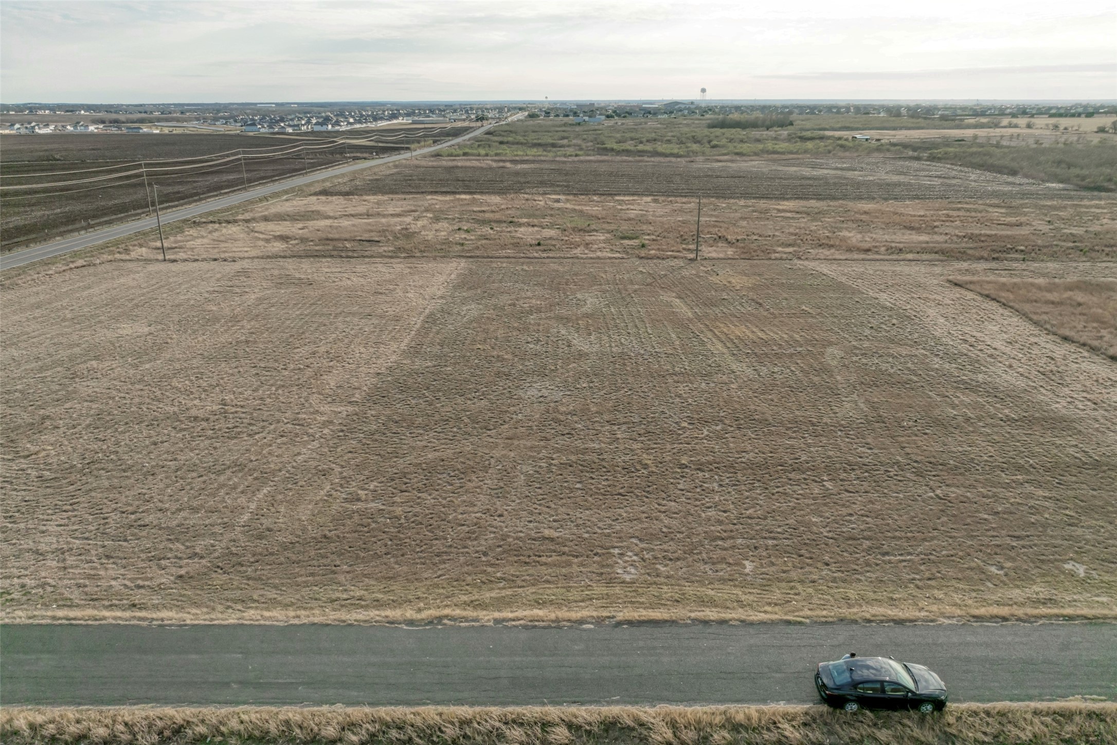 18701 Carlson Road Elgin, TX 78621 - Photo 6 of 17 a view of an ocean and beach