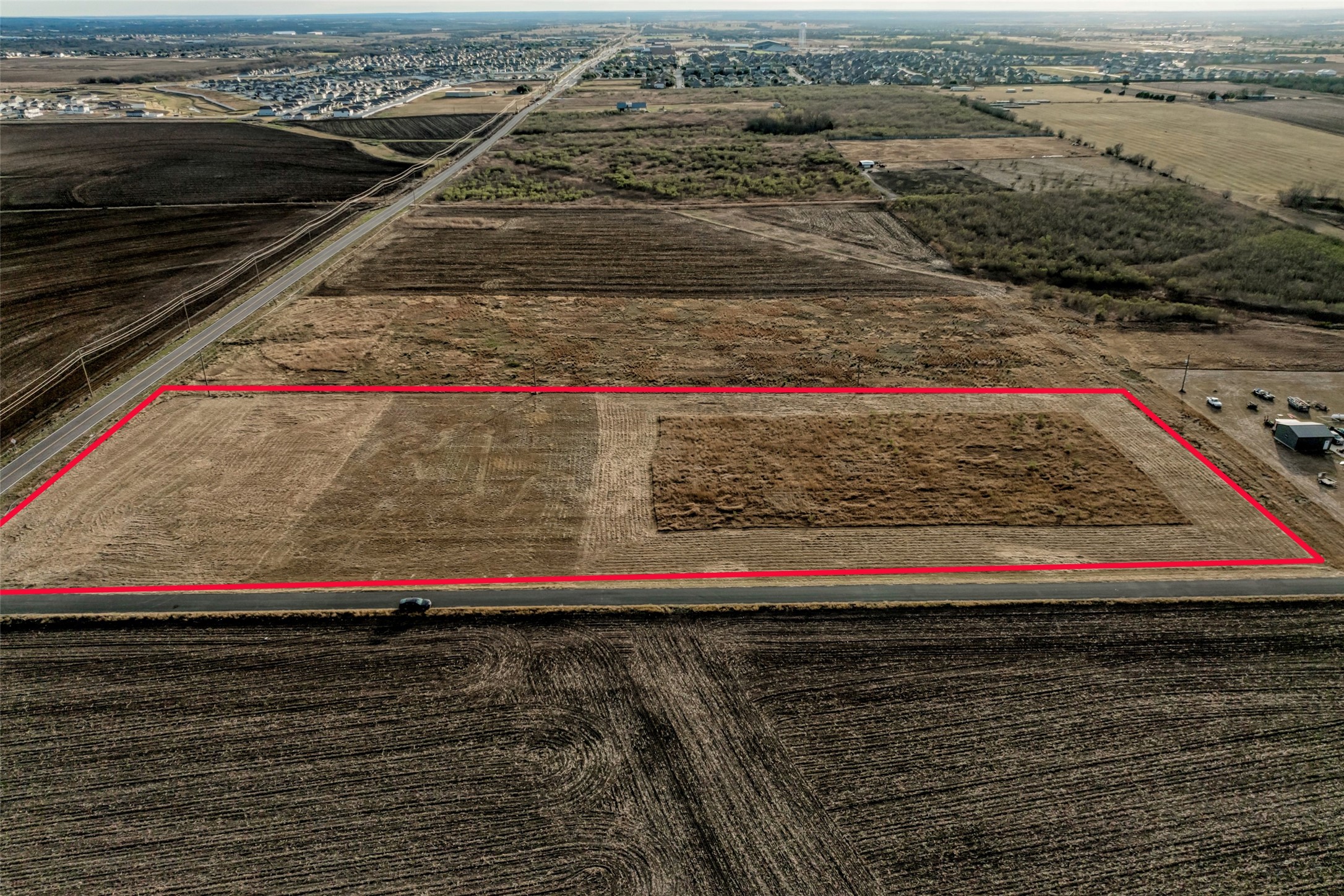 18701 Carlson Road Elgin, TX 78621 - Photo 8 of 17 a view of wooden floor