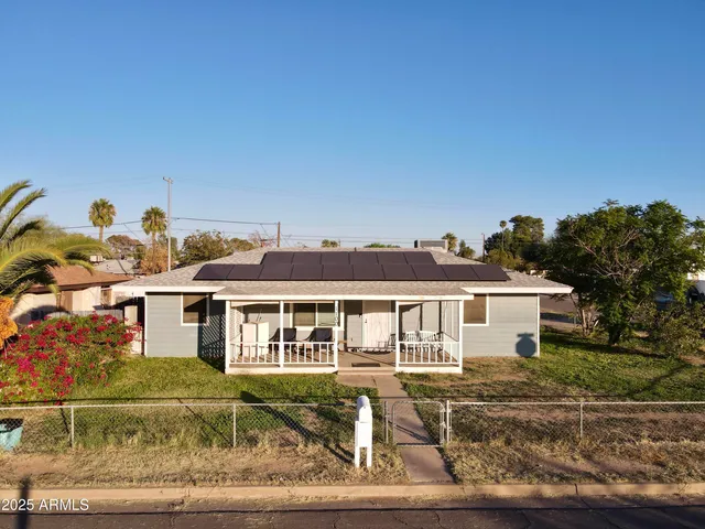 a front view of a house with a porch
