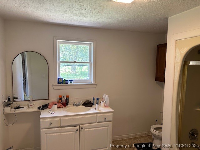 997 Balfour Road Red Springs, NC 28377 - Photo 7 of 20 a bathroom with a sink and a toilet